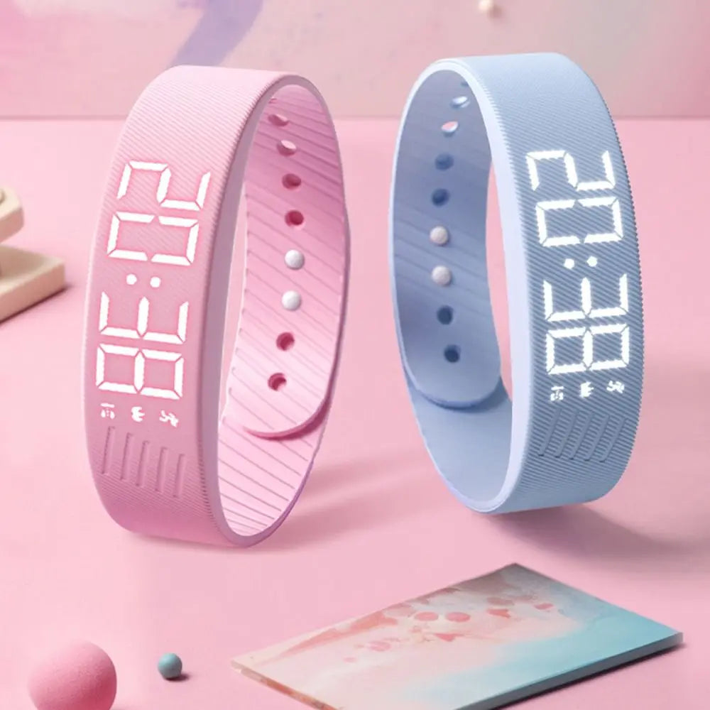 WristWake bands in pink and blue for kids and teens