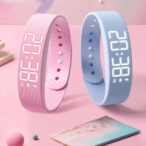 WristWake bands in pink and blue for kids and teens